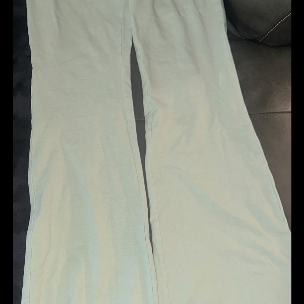 TNA teal leggings